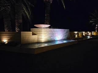 Water feature spilling into the pool