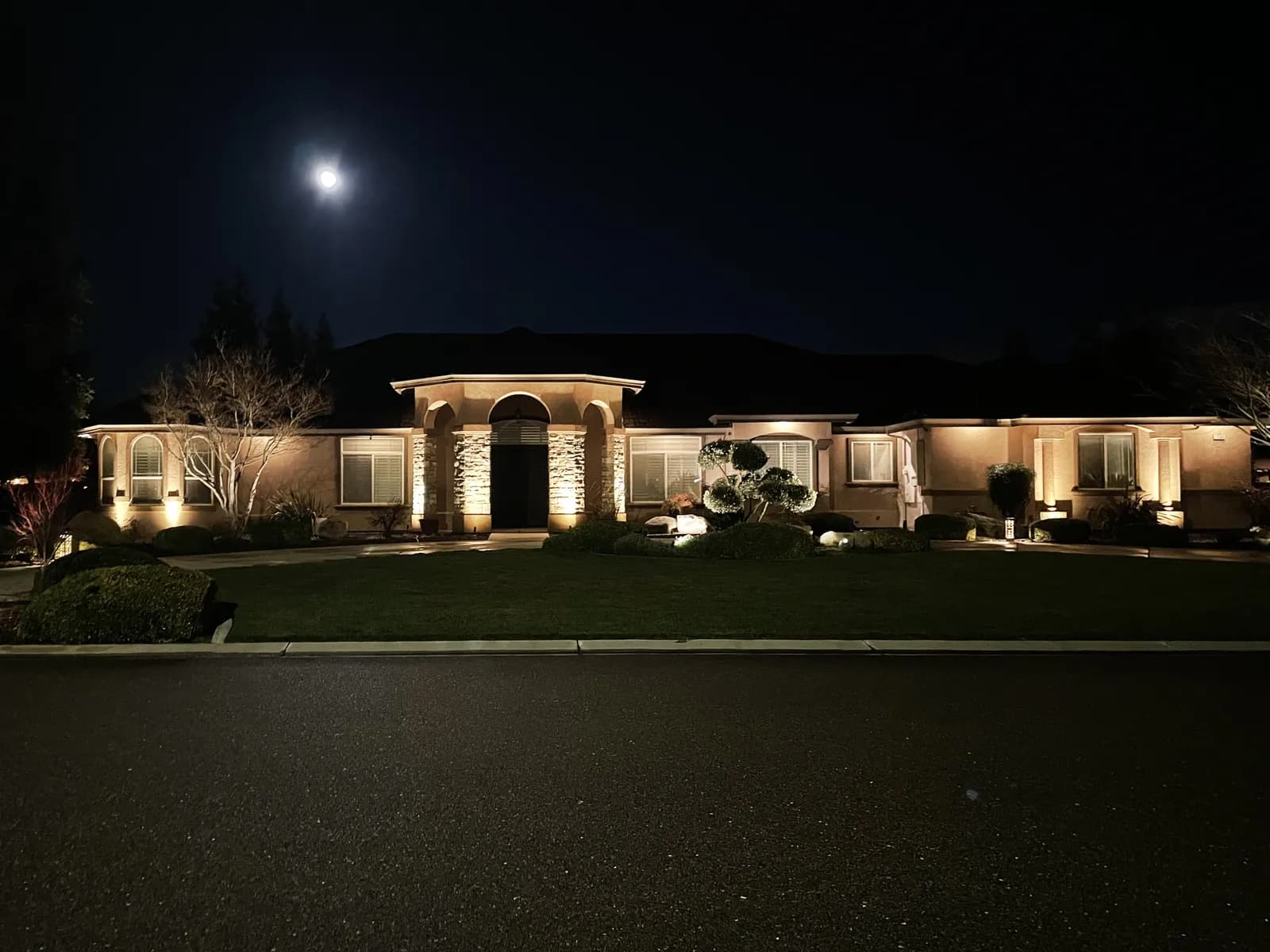 Estate home in Central California lit in warm white
